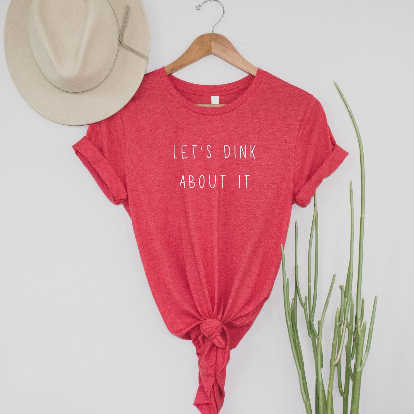 White Let's Dink About It Pickleball T-shirt | Punny Pickle ball Short Sleeve Tee | Pickleball Shirts for Women & Men | Best Pickleball Gift